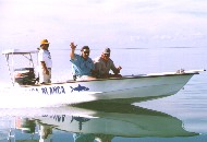 Crusing the flats in a Casa Blanca Lodge skiff