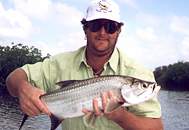 Big John Lafleur with a tarpon  (tarpon looks very small)