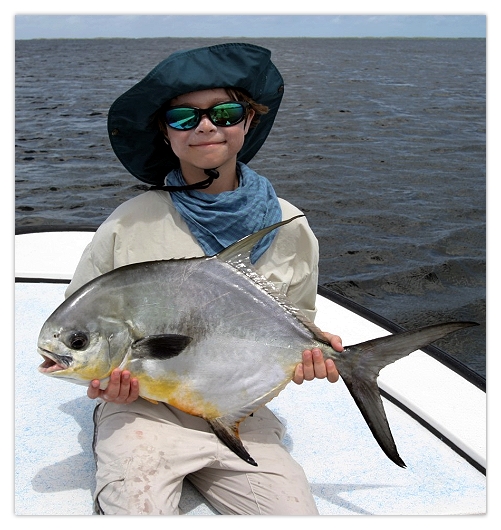 Aaron with a nice Turneffe permit he caught!